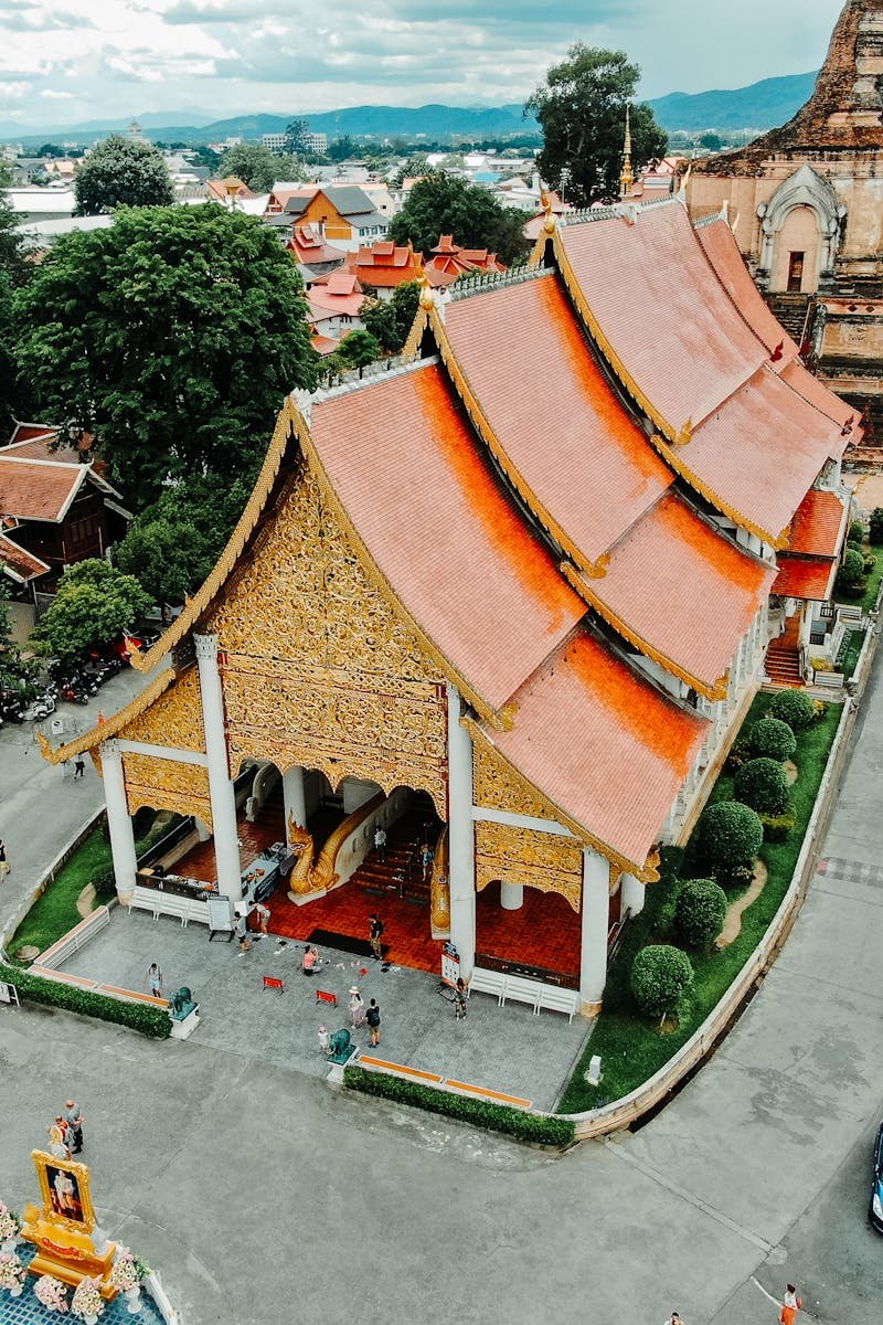 Stunning aerial view of Wat Chedi Luang, showcasing traditional Thai architecture in Chiang Mai, Thailand.