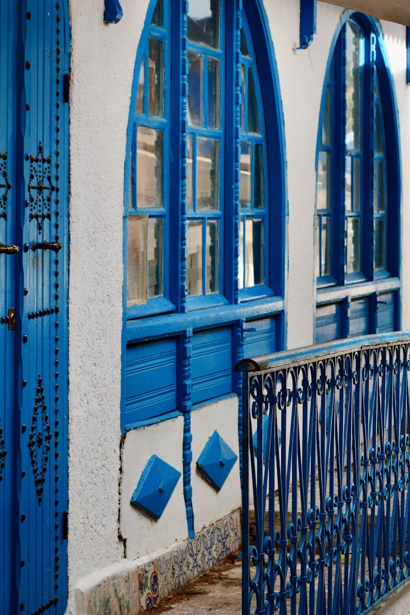 Charming blue arches and doors in traditional Tunisian architecture at Kartaca.