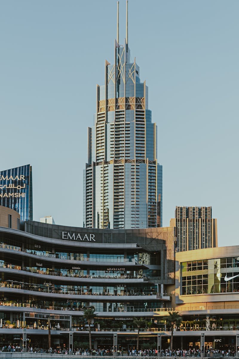View of modern architecture with skyscrapers and shopping centers in downtown Dubai.